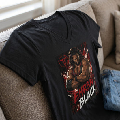 Lifestyle shot of EB Dominance V-neck T-shirt styled with jeans on textured sofa with soft indoor light.