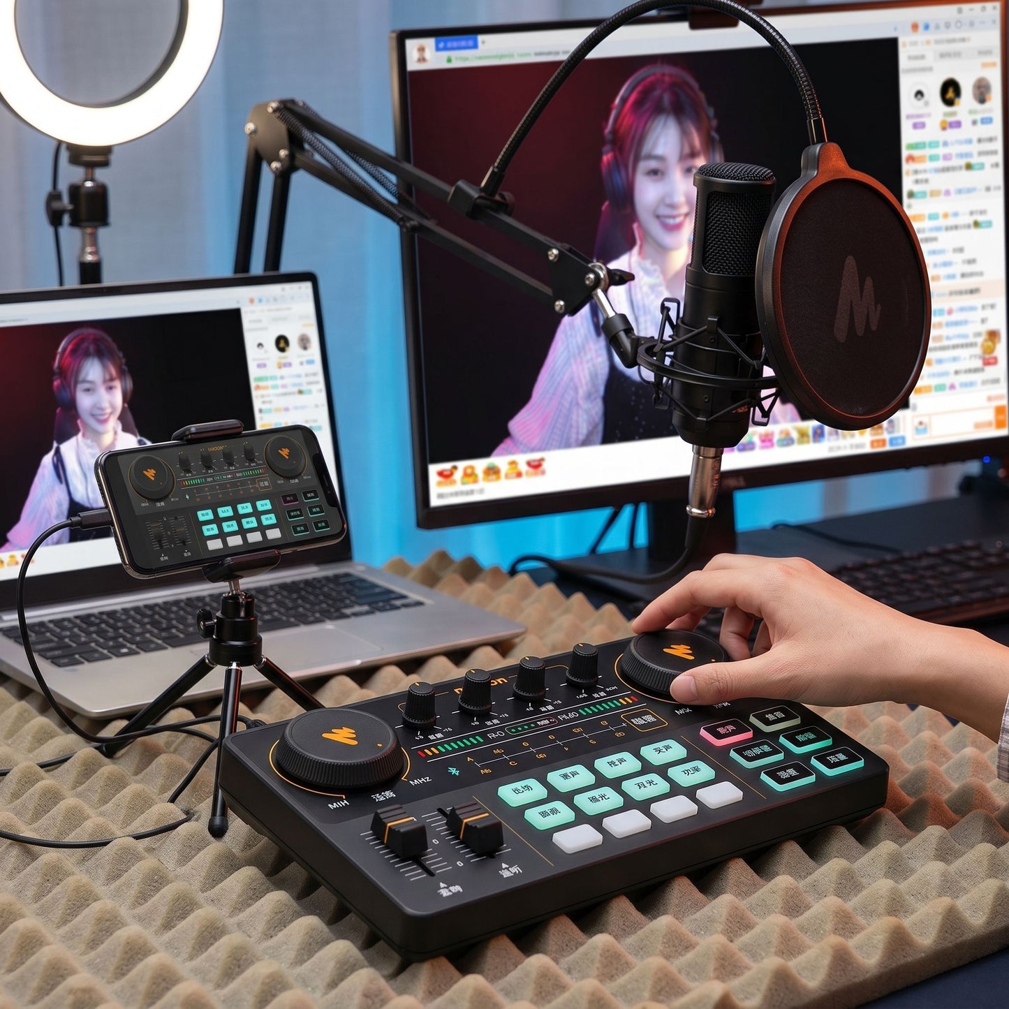 Active live streaming scene with the sound card set in focus, featuring a microphone and laptop for professional use.